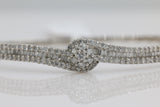 Swirl Baguette Cut Diamond Bangle in 14KT White Gold ( 2ct tw dia )