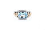Italian sterling silver ring with a blue topaz center and 0.05ct diamond with 14K solid yellow gold accent