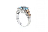 Italian sterling silver ring with a blue topaz center and 0.05ct diamond with 14K solid rose gold accent