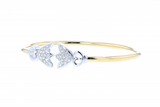 Solid 14K yellow gold flex bangle bracelet with 0.75ct diamonds and 14K white gold accents