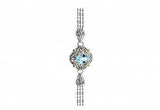 Italian sterling silver bracelet with blue topaz center stone, 0.15ct white diamonds and solid 14K yellow gold accents