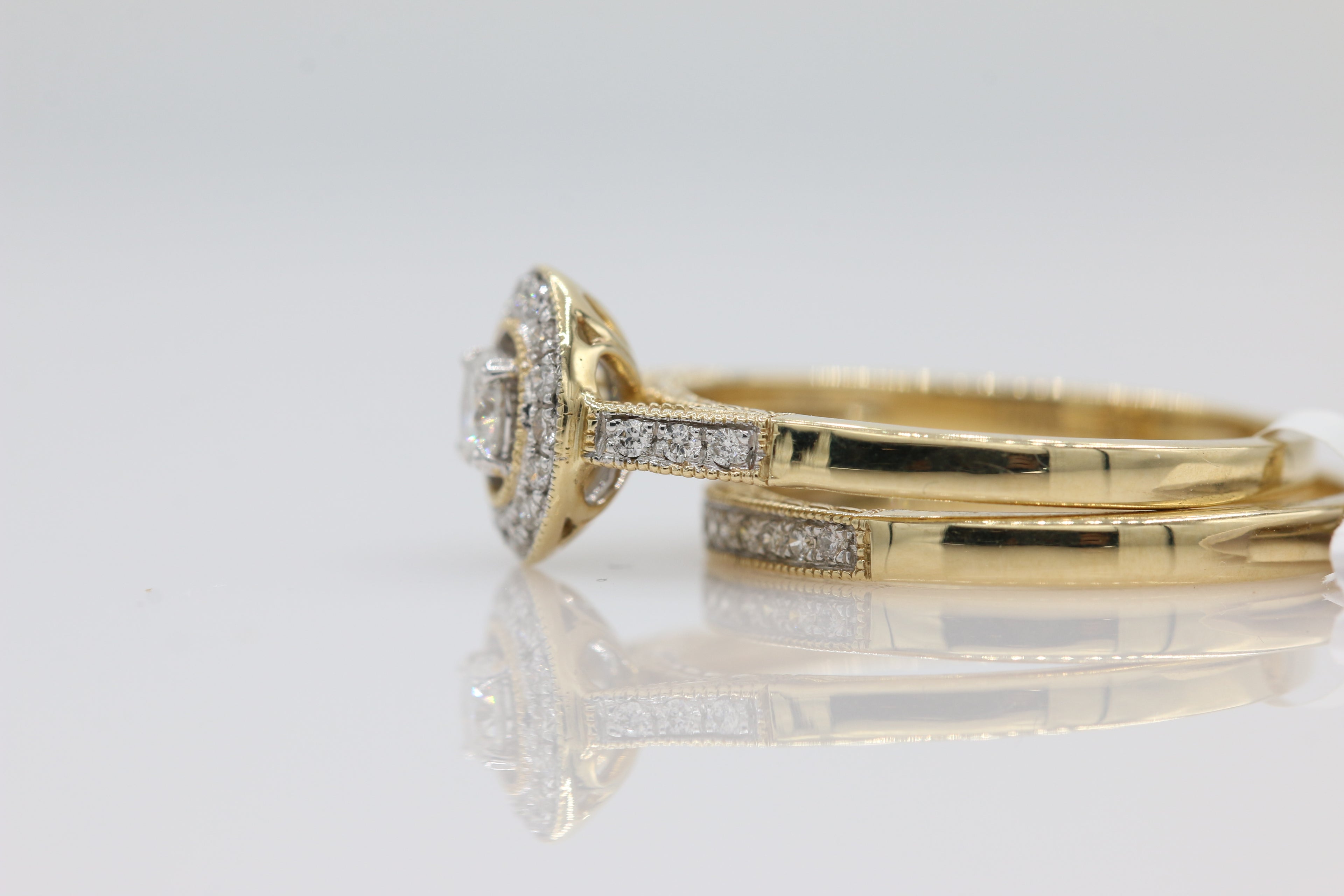 Diamond Halo Rings Set in 14KT Yellow Gold ( 0.35ct dtw )