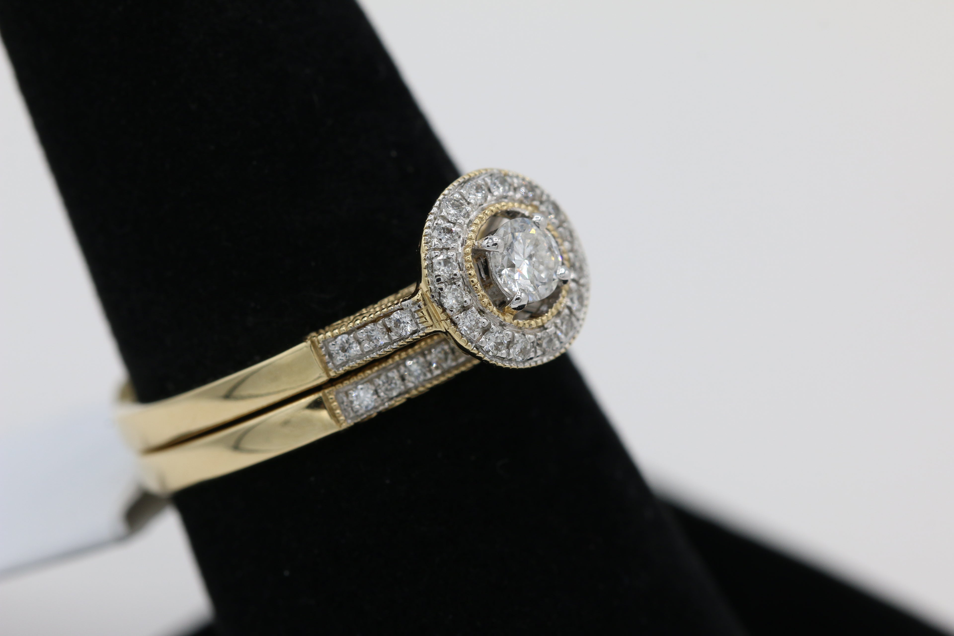 Diamond Halo Rings Set in 14KT Yellow Gold ( 0.35ct dtw )