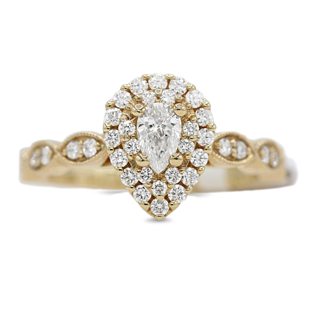 Pear Diamond Ring with Halo in 14KT Yellow Gold ( 5.8ct tw dia / 1.4 ctw )