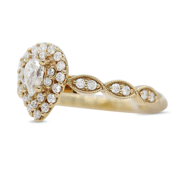 Pear Diamond Ring with Halo in 14KT Yellow Gold ( 5.8ct tw dia / 1.4 ctw )