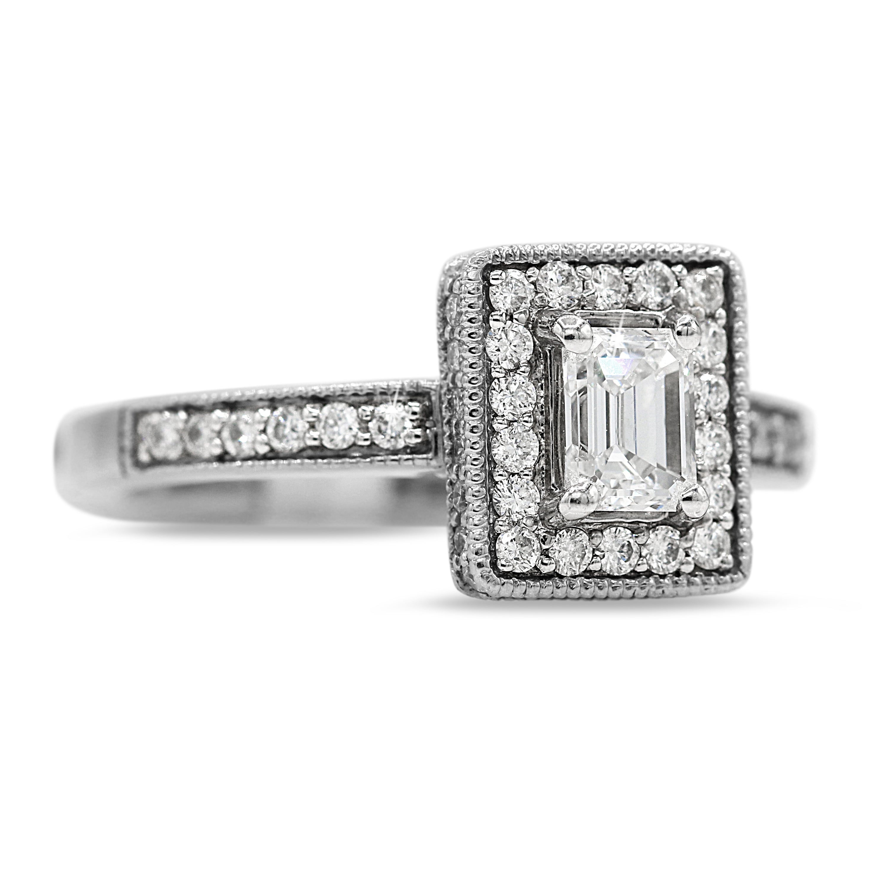 Emerald Cut Diamond Ring with Halo in 14KT White Gold ( 1ct tw dia )