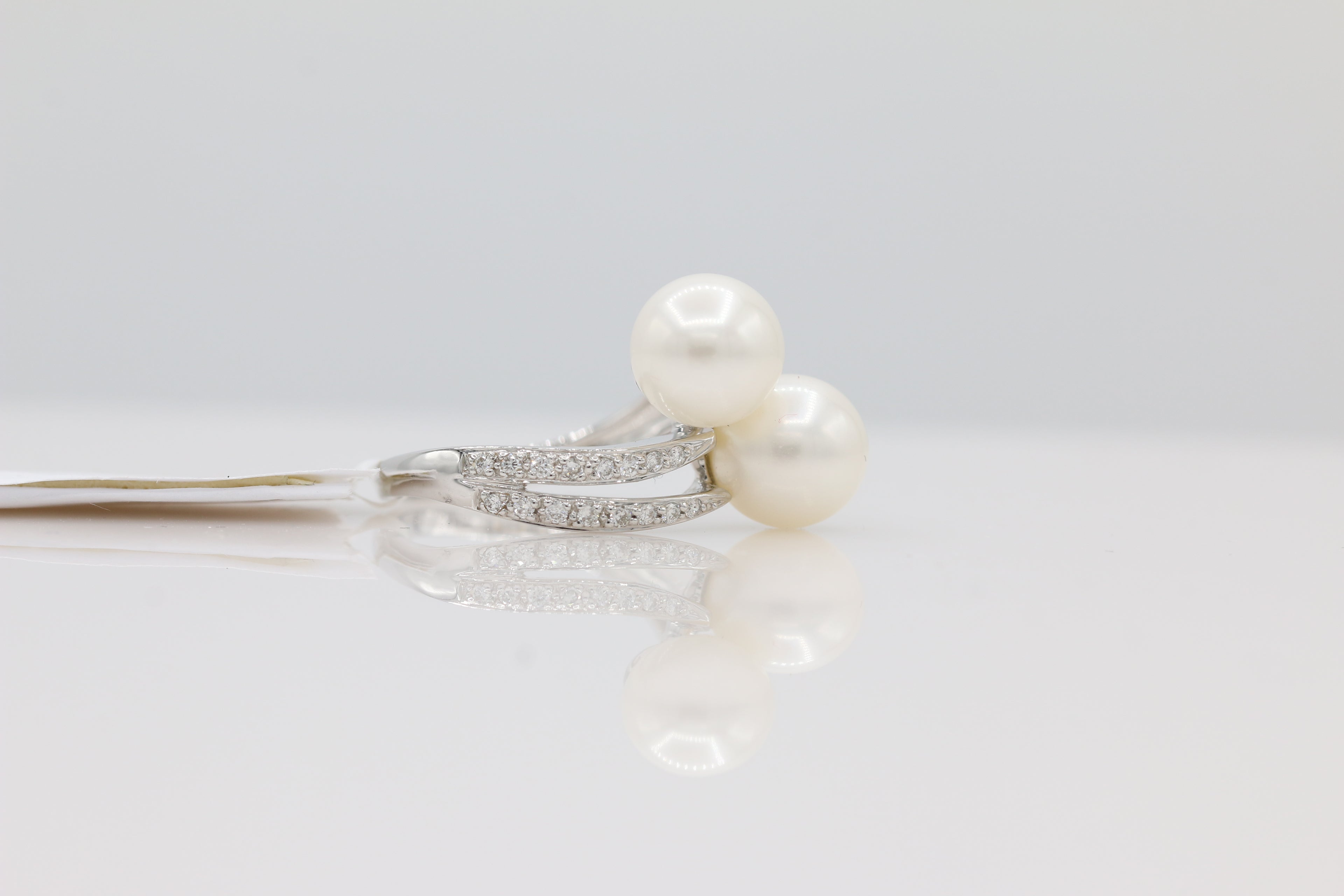 Pearl and Diamond Bypass Ring in 14KT White Gold