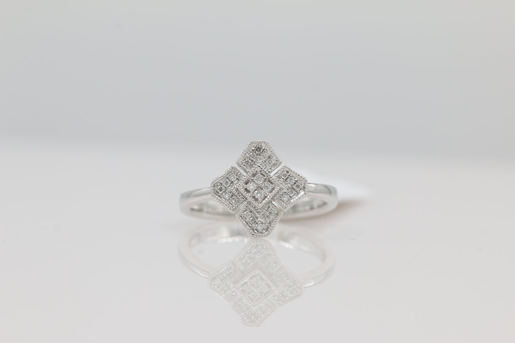 Diamond Cluster Ring in 14KT White Gold ( 0.11ct tw dia )