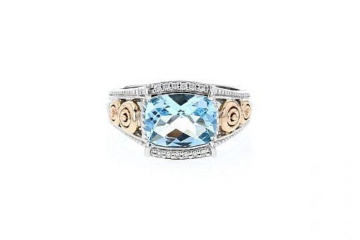 Italian sterling silver ring with a blue topaz center and 0.05ct diamond with 14K solid rose gold accent