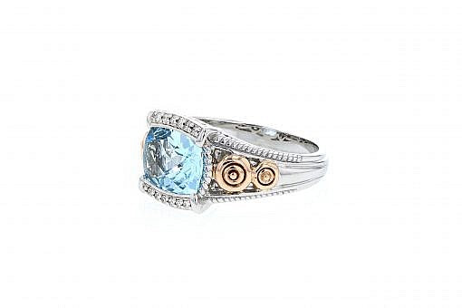 Italian sterling silver ring with a blue topaz center and 0.05ct diamond with 14K solid rose gold accent