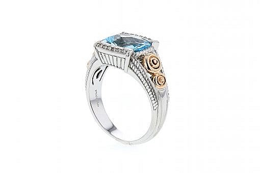 Italian sterling silver ring with a blue topaz center and 0.05ct diamond with 14K solid rose gold accent
