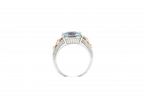 Italian sterling silver ring with a blue topaz center and 0.05ct diamond with 14K solid yellow gold accent