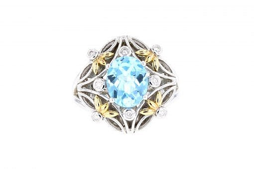 Limited Edition Italian sterling silver ring with a blue topaz center stone, 0.13ct white diamonds and 14K solid yellow gold accents