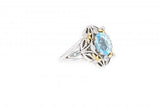 Limited Edition Italian sterling silver ring with a blue topaz center stone, 0.13ct white diamonds and 14K solid yellow gold accents