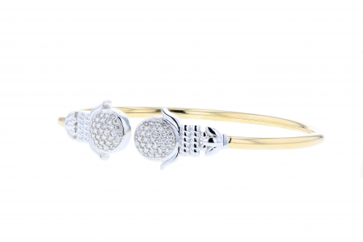 Solid 14K yellow gold flex bangle bracelet with white gold accents and 0.75ct diamonds