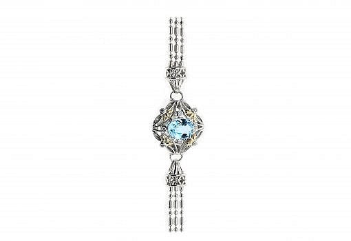 Italian sterling silver bracelet with blue topaz center stone, 0.15ct white diamonds and solid 14K yellow gold accents