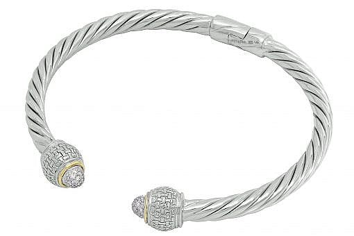 Limited Edition Italian Sterling Silver Bracelet with 0.23ct diamonds and 14K solid yellow gold accents.