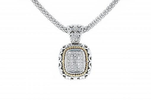 Italian Sterling Silver Pendant with 0.60ct diamonds and 14K solid yellow gold accents.  The chain is included.
