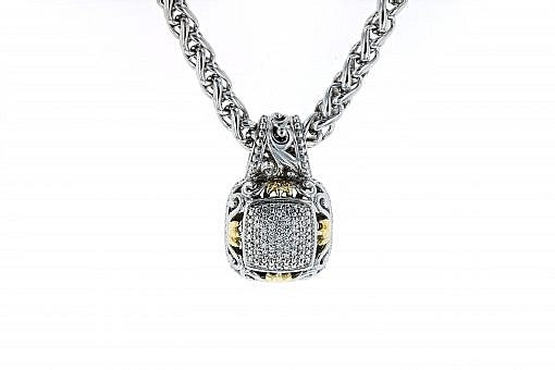 Italian Sterling Silver Pendant with 0.25ct diamonds and 14K solid yellow gold accents. The chain is included.