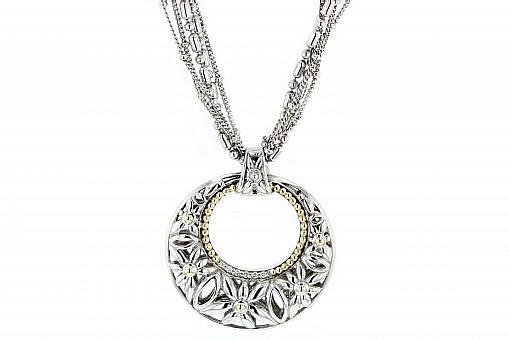 Italian sterling silver pendant with 0.10ct diamonds and solid 14K yellow gold accents. A multi-strand chain is included.