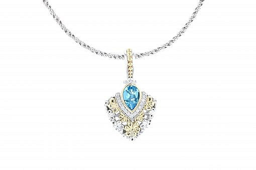Italian Sterling Silver Pendant with a blue topaz center stone, 0.15ct white diamonds and 14K solid yellow gold accents. The chain is included.