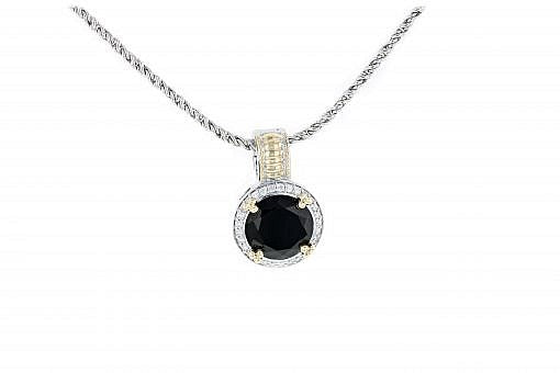 Italian sterling silver pendant with black onyx center stone, 0.38ct white diamonds and solid 14K yellow gold accents.  The chain is included